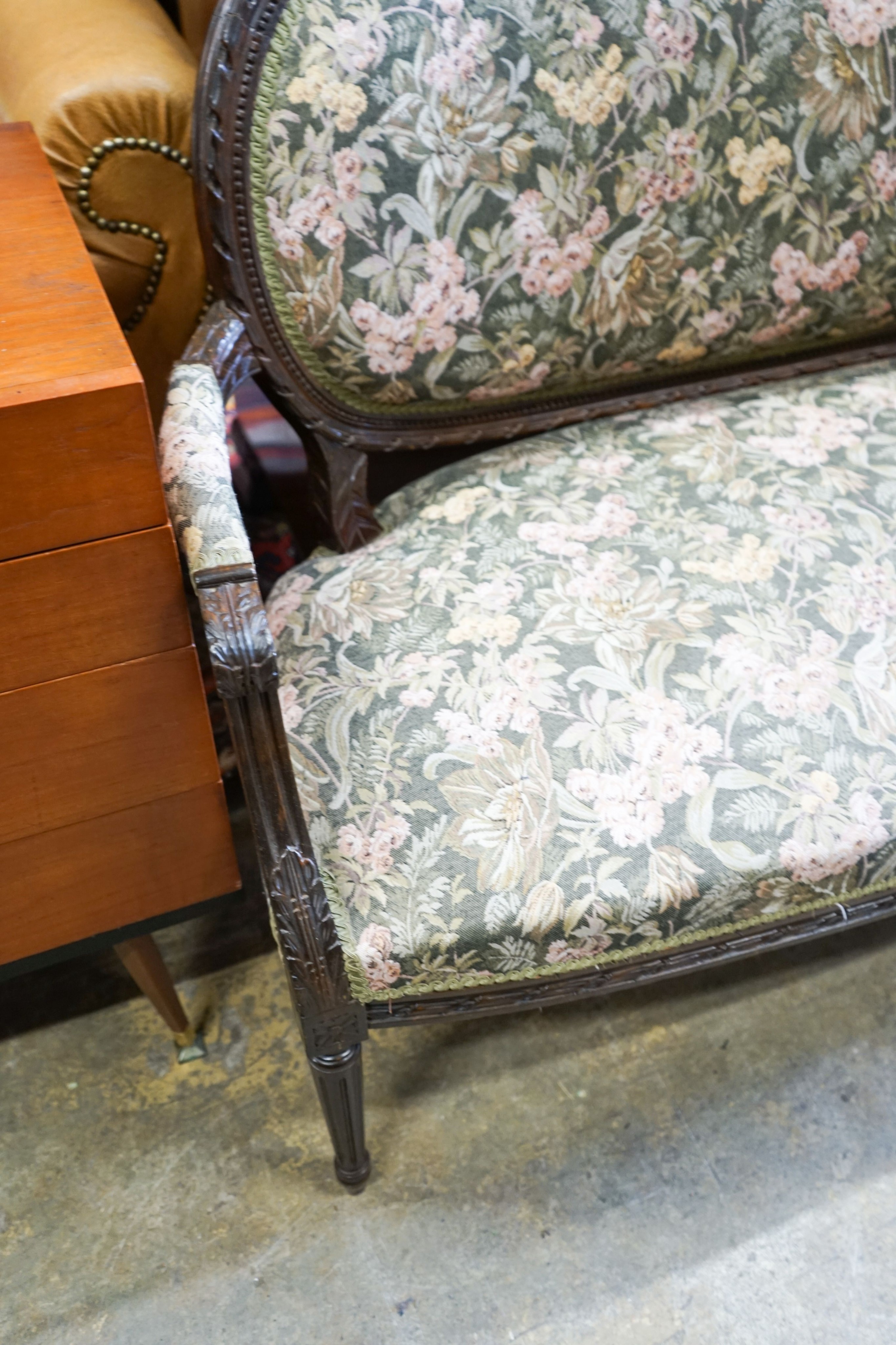An early 20th century French carved frame upholstered canape, length 132cm, depth 52cm, height 94cm